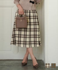 レディース スカート ロング ミモレ タータンチェック チェック柄 V字 細見え 華奢 秋 冬 厚手 ファスナー かぎホック エレガント フェミニン 上品 カジュアル フレアシルエット タック ウエストゴム アイボリー グレー デザインベルト チェック スカート le reve vaniller