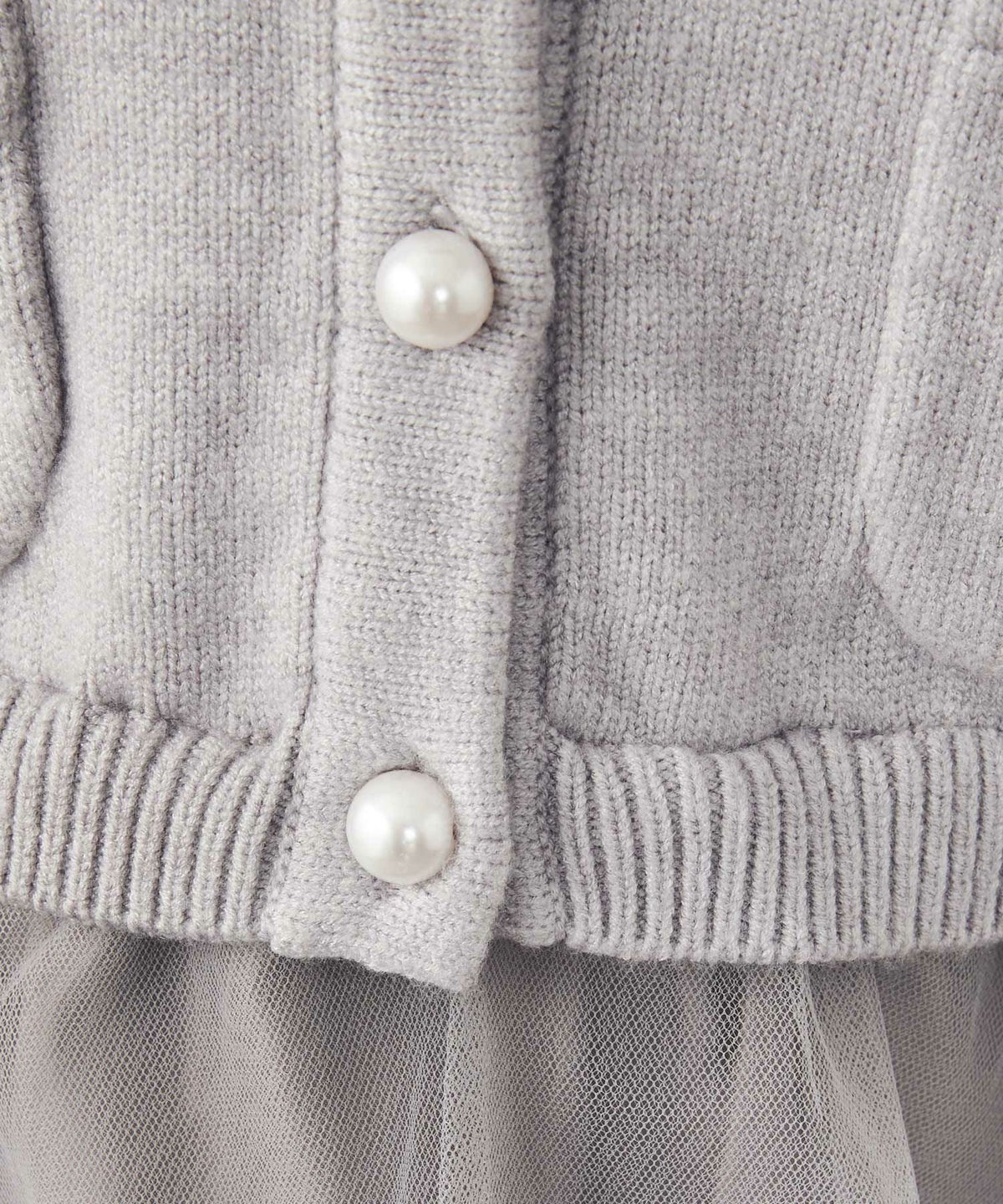 手洗い可レディーストップスニットかわいいきれいめオフィスチュール長袖黒おすすめジョイントスペース