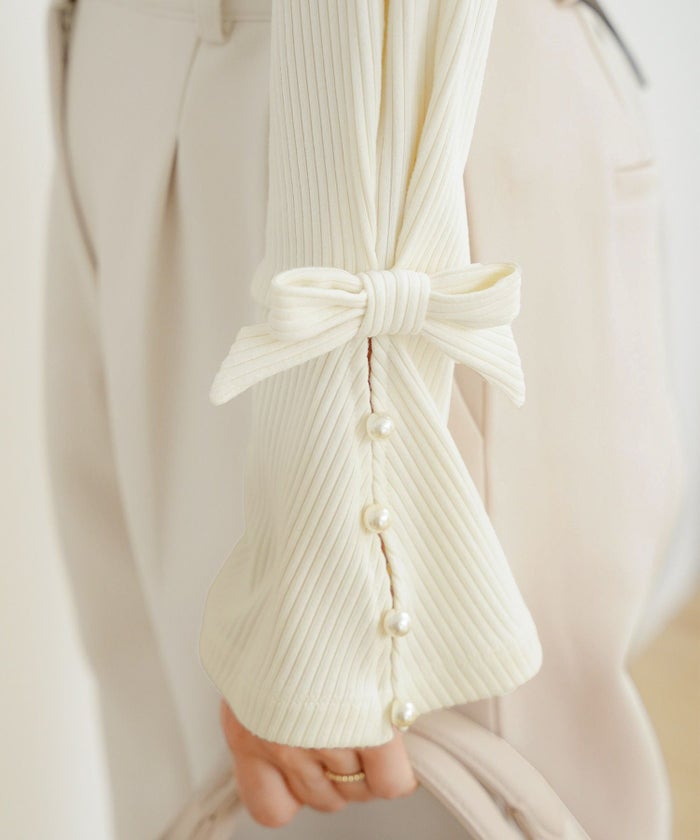 トップス カットソー リブ 袖口 リボン 切替 フレア ベルスリーブ フレアスリーブ シンプル 袖映え パール クルーネック 春 秋