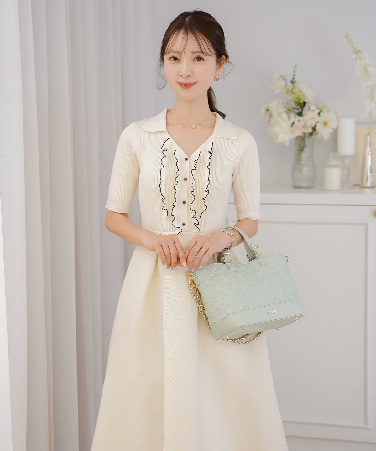 ニット ワンピース フリル 前開き 授乳 ママ きれいめ フェミニン 上品 ママ友 かわいい 大人 配色 ゴールド 半袖 5分袖 フレア フレアシルエット タック ミモレ 開襟 デコルテすっきり 襟付き 春 夏